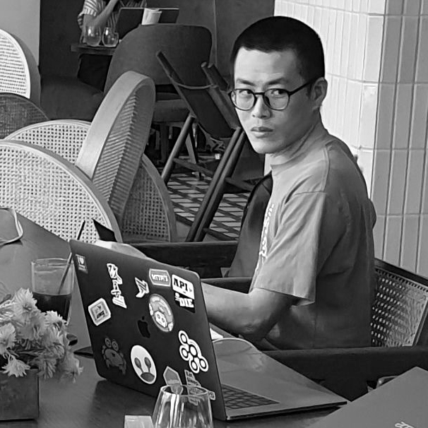 photo of Tony Chen at a cafe/coffee-shop, known as
                                                             Straits Clan, on the island of 
                                                             Singapore; circa 2019 A.D.